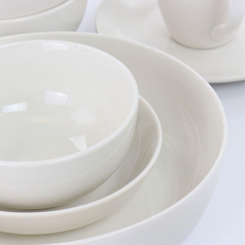 Elama Iris 32 Piece Porcelain Dinnerware Set with 2 Serving Bowls in White - Image 5
