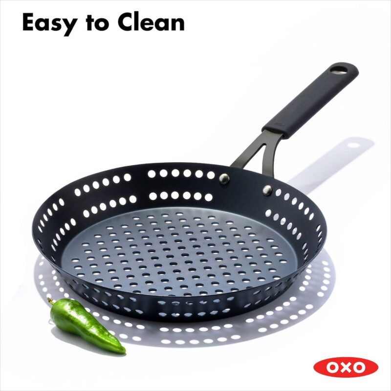 OXO Obsidian Pre-Seasoned Carbon Steel 12-in. Frypan with Holes for Grilling with Removable Silicone Handle Holder - Image 8