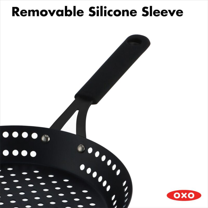 OXO Obsidian Pre-Seasoned Carbon Steel 12-in. Frypan with Holes for Grilling with Removable Silicone Handle Holder - Image 4