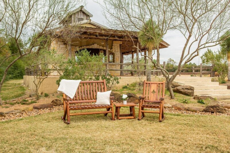 Leigh Country TX 36003 Amber-Log Fleur-De-Lis Adult Wood Outdoor Patio Rocking Chair - Brown - Image 4